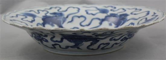 A Chinese blue and white lion-dog dish, Kangxi period, 35.5cm